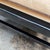 Black Pair of Baker Furniture Black Lacquered Wood Frame Ottomans With Ivory Upholstered Cushions For Sale - Image 8 of 8