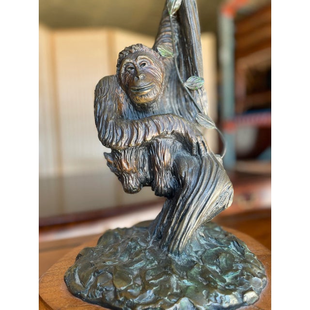 "Mr. Clyde" is a striking bronze sculpture by the late artist Carl Wagner, depicting a gorilla hanging from a tree branch....