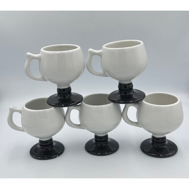 Charming set of 5 vintage Caribe Diner Puerto Rico Pedestal Coffee Mugs! These delightful mugs feature a classic Mid-...