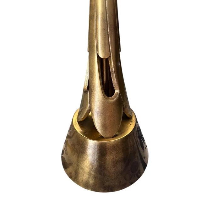 This RARE and stunning mid-century modern atomic-style brass lamp has a unique style that will make a statement piece in...