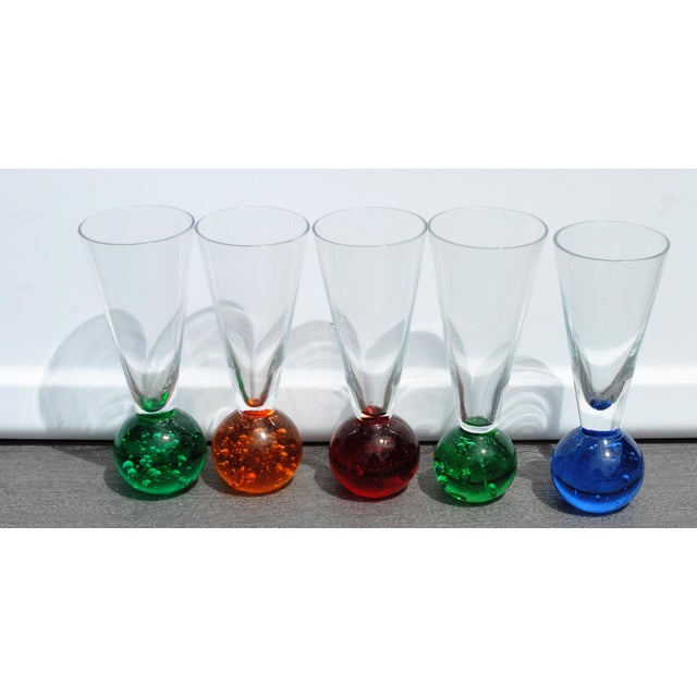 Vintage Bullicante "bubble bottom" cordials or shot glasses. Varied colored bottoms with clear tops. Fun barware for your...