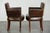 This set of 2 vintage dining chairs is made of grained cowhide leather with deep colors and a comfortable seat. The chairs...