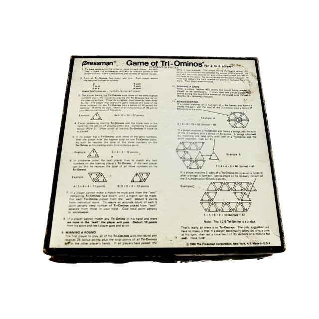 Vintage Tri-Omino game with all 56 triangular black tiles. Each black tile with easy to read white numbers is 1.5” L x...
