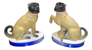 Pair of Mottahedeh Pug Dog Figures, Staffordshire Style, Mid-20th Century.