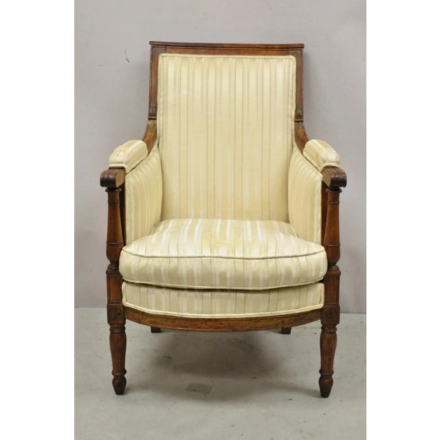 Antique 19th C. French Louis XVI Neoclassical Style Walnut Bergere Lounge Chair. Item features antique joinery and...