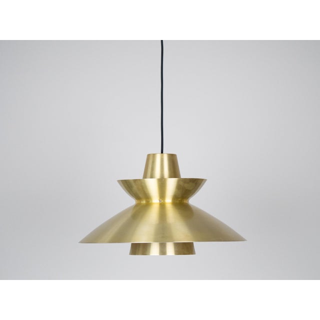The Navy Pendant is a lamp designed by Jørn Utzon in 1947, best known for designing the Sydney Opera House. Its form is...