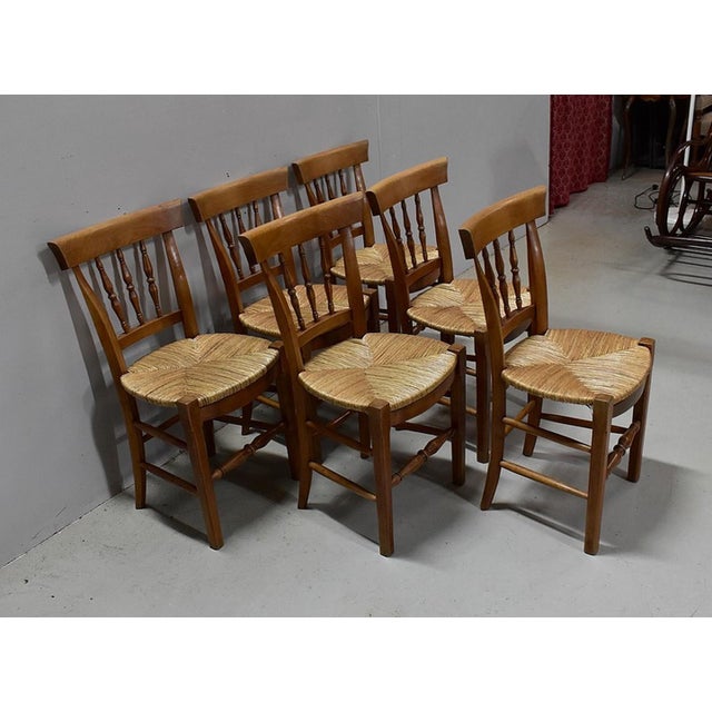 Continuation of six blonde cherry chairs with slightly convex sides with artisanal mulch in perfect condition. The files...