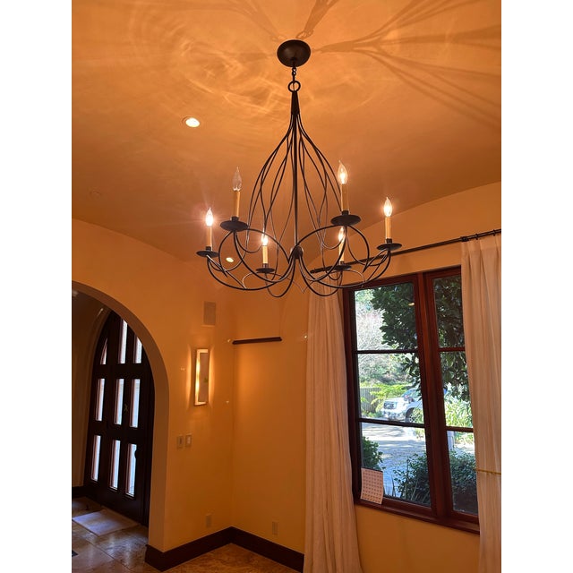Jolie 6 Light Chandelier 8027 With forms reminiscent of a dance, the graceful lines of the Jolie Chandelier are shapely...