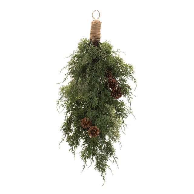 Enhance your holiday decor with the Pine and Pinecones Wall Swag. This stunning swag features earthy green and brown...