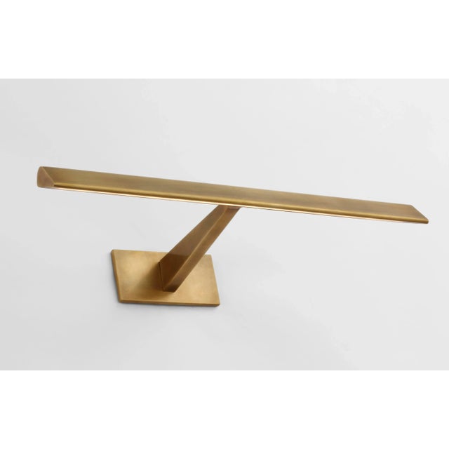 Petrel 18" Picture Light in Hand-Rubbed Antique Brass Designer: Ian K. Fowler Height: 2.5" Extension: 8.25" Backplate:...