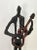 Up for sale is this evocative sculpture of a guitarist - but is he playing rock or jazz... or other? That's up to you to...