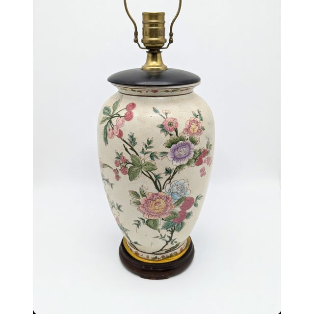 This charming vintage table lamp is a one-of-a-kind statement piece! The substantial ceramic vase base features beautiful...