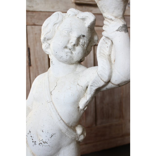 Exceptional 19th-century French cast concrete garden statue exquisitely detailed with figural putti (as found.) Display...