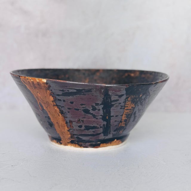 Large hand-thrown studio pottery bowl, signed and dated "J.A. Ridley 2013" on the underside. Striking tenmoku-style drip...