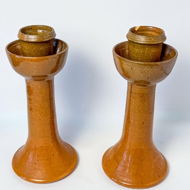Wonderful vintage pair of hand-thrown pottery candlesticks by renowned North Carolina potter Ben Owen Sr. (1904–1983)....