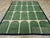 A vintage Turkish Art Deco style room size carpet handmade during the mid-20th century. Measures: 9' 10" x 13' 7".