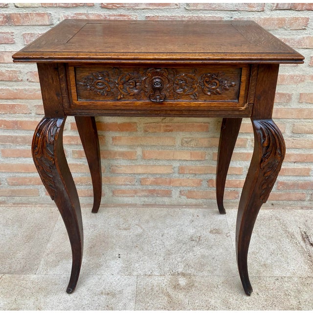 Elegant French side table in the Louis XV style, crafted in wood and distinguished by its graceful proportions and finely...