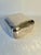 A beautiful and simply designed Hammered silver plate lidded box with rounded corners. A compliment to any space as a...