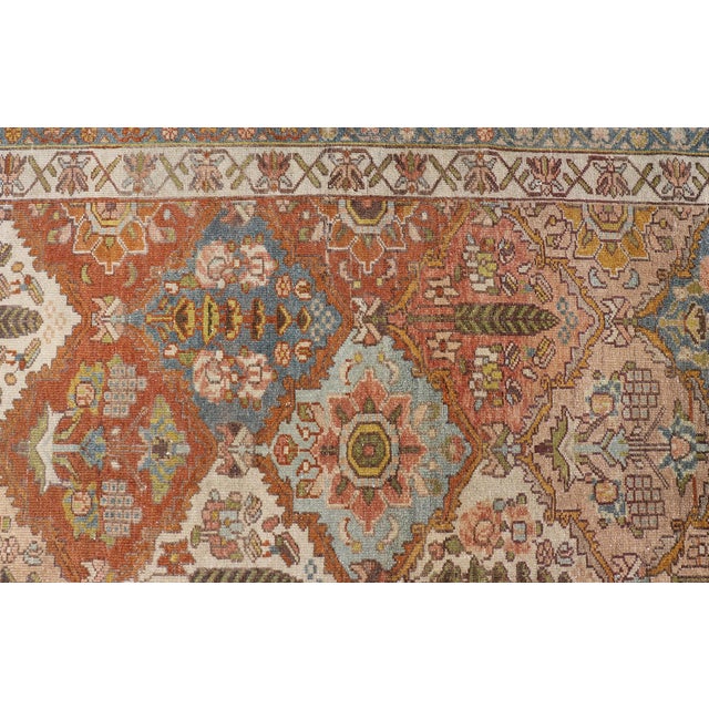 Measures: 5'2 x 12'2 Antique Persian Bakhtiari Gallery Rug with Garden Design and Rust Field. Keivan Woven Arts/...