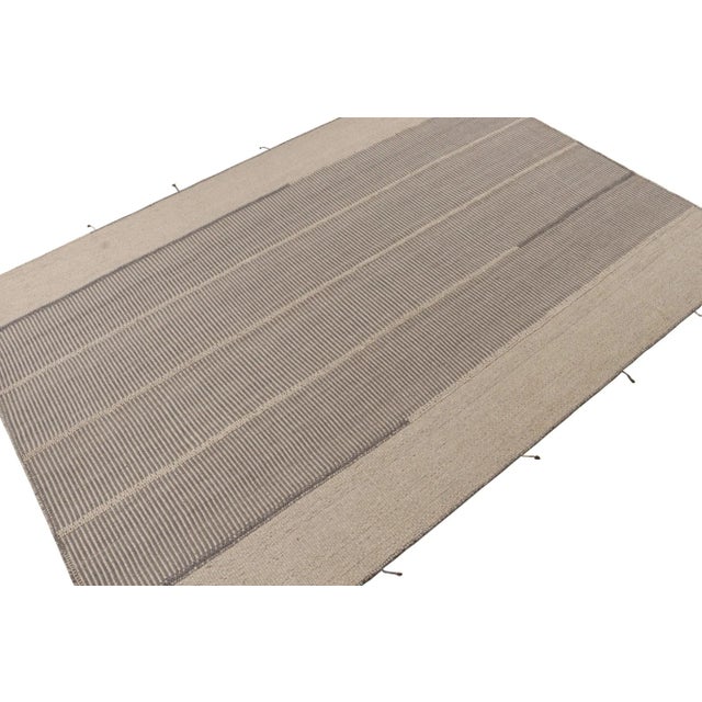 Handwoven in wool, a 10x14 Kilim design from an inventive new contemporary flat weave collection by Rug & Kilim. On the...