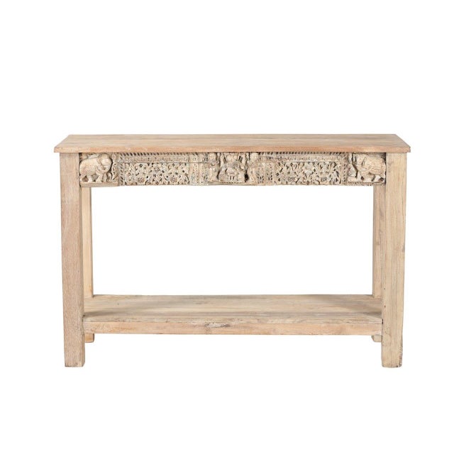 This Console Table Constructed from Antique Indian Carved Elements and Reclaimed Wood features an intricately carved apron...