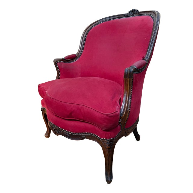 Gondola-Style Bergère Chair in Carved Walnut with Bronze Nails For Sale