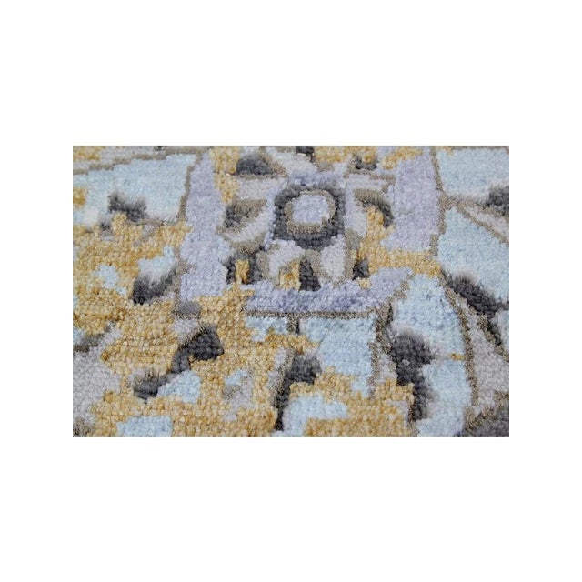 Revamp your home with a 9x12 Transitional Rug from India. Exquisite craftsmanship meets timeless design, creating a...