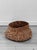 This stunning handmade raffia basket showcases a truly unique shape that sets it apart from ordinary baskets. The...