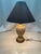 Bring striking contrast and rich texture to your space with this vintage ceramic table lamp. The bulbous body features a...