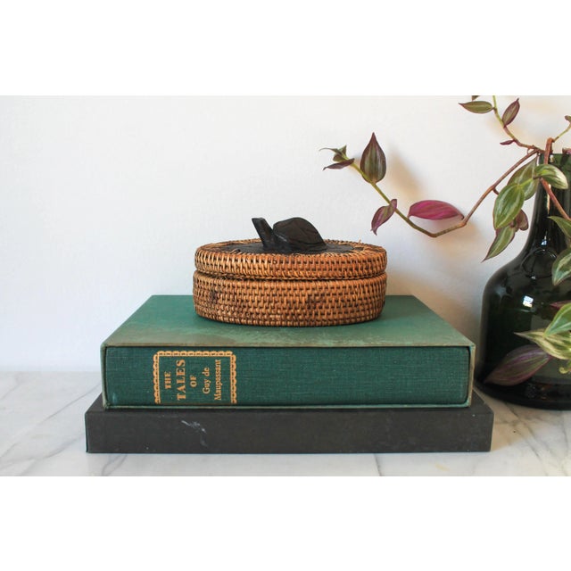 Vintage woven wicker trinket box with wooden tortoise decoration. No makers mark. Some minor age wear.