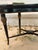 A beautifully crafted Maitland-Smith hand-painted accent table featuring the brand’s renowned artistry and timeless...