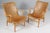 Bruno Mathsson pair of Eva lounge chair with patinated saddle leather Frame in beech. Made by Karl Mathsson. This piece is...