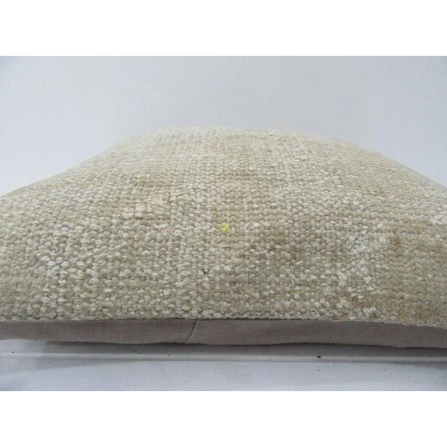 This is a pillow cover made from a vintage kilim rug. The piece was properly washed and ready to use. Pillow inserts not...