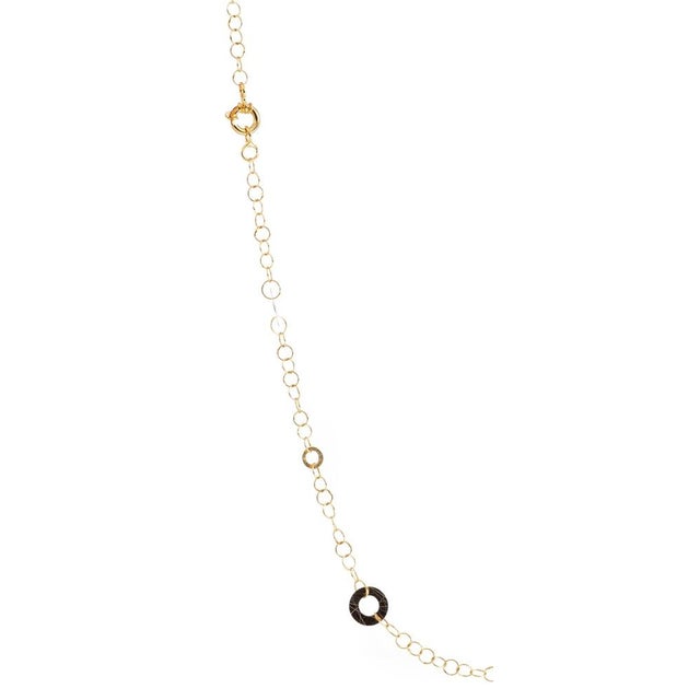 19.2K Gold Chain. Portuguese, 20th century; in 19.2kt bicolor gold; in round wire links and hammered rings. with 'deer'...