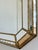 A large vintage Spanish Venetian-style Octagonal beveled wall mirror, dating to the 1980s. The mirror has a decorative...