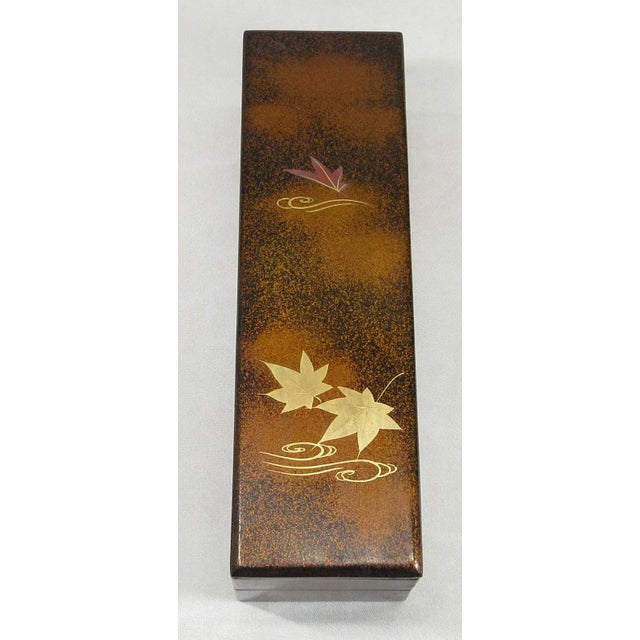 Japanese lacquered inkstone calligraphers' case from the Meiji period. Three parts are covered in nashiji with gold maki-e...