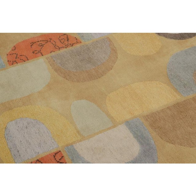 This hand-knotted wool and silk 8x10 modern rug represents an exclusive design from Rug & Kilim’s Mid-Century Modern rug...