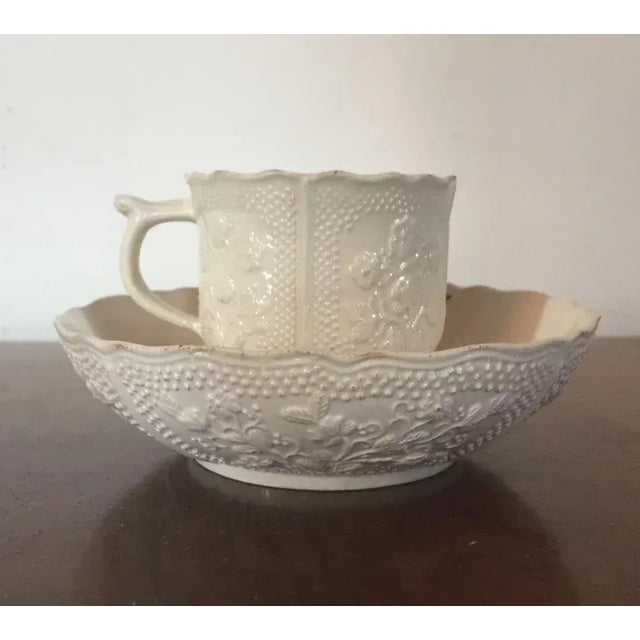 Rare antique 18th c. French Rambervillers creamware tea cup and saucer circa 1760. U-shaped cup with four moulded panels...