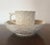 Rare antique 18th c. French Rambervillers creamware tea cup and saucer circa 1760. U-shaped cup with four moulded panels...