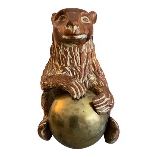 Late 20th Century Sarreid Ltd. Hand Carved Wooden Bear With arass Ball For Sale