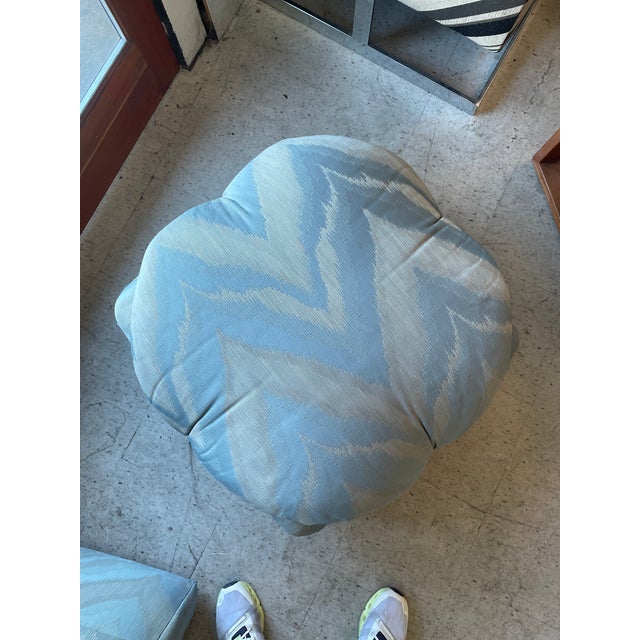Vintage blue ottoman with a clean, versatile design. Upholstered in a soft blue fabric, this piece works beautifully as...