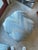 Vintage blue ottoman with a clean, versatile design. Upholstered in a soft blue fabric, this piece works beautifully as...