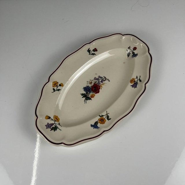 Small oval "Agreste" dish, Sarreguemines, 20th century. Dimensions: Diameter: 27 x 16.5 cm Height: 3 cm Good overall...