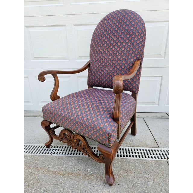 A beautiful Victorian style armchair with blue upholstery featuring a flower motif. This chair is in very good vintage...