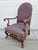 A beautiful Victorian style armchair with blue upholstery featuring a flower motif. This chair is in very good vintage...