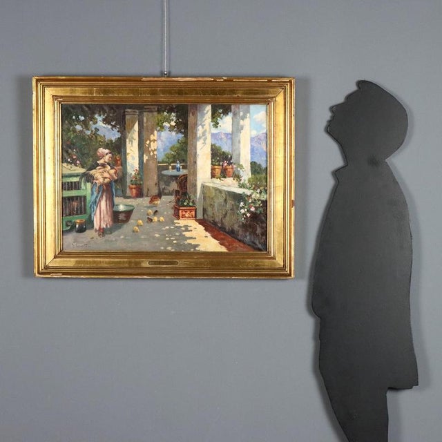 Oil on canvas. Signed G. Esposito lower left. A classic Neapolitan school subject, depicting the corner of a flower-filled...