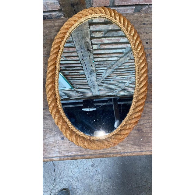 Large oval rope mirror Audoux Minet, circa 1960 from South of France. 21.5 inches Height / 14.5 inches Width