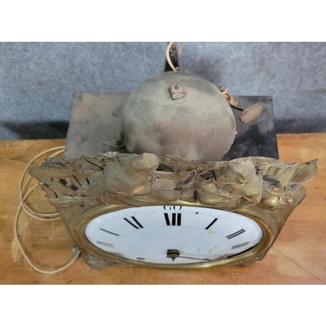 19th-century Comtoise clock movement in repoussé copper Used condition H 42 x W 28 x D 14 cm