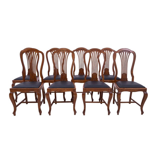 Antique table with eight chairs from around 1890, France. The furniture is in very good condition, after professional...