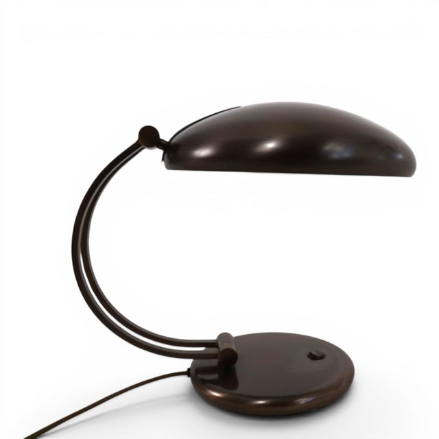 This exceptional vintage table lamp from Hillebrand combines sculptural mid-century design with high-quality German...